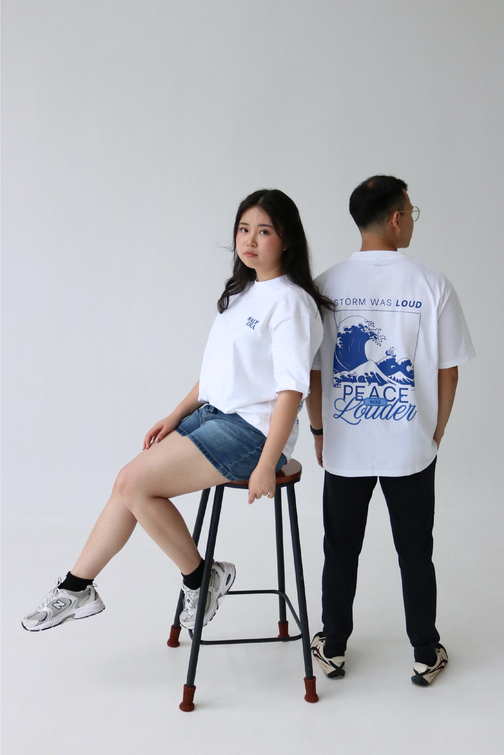 Oversized graphic white T-shirt design - "Storm was loud, peace was louder"