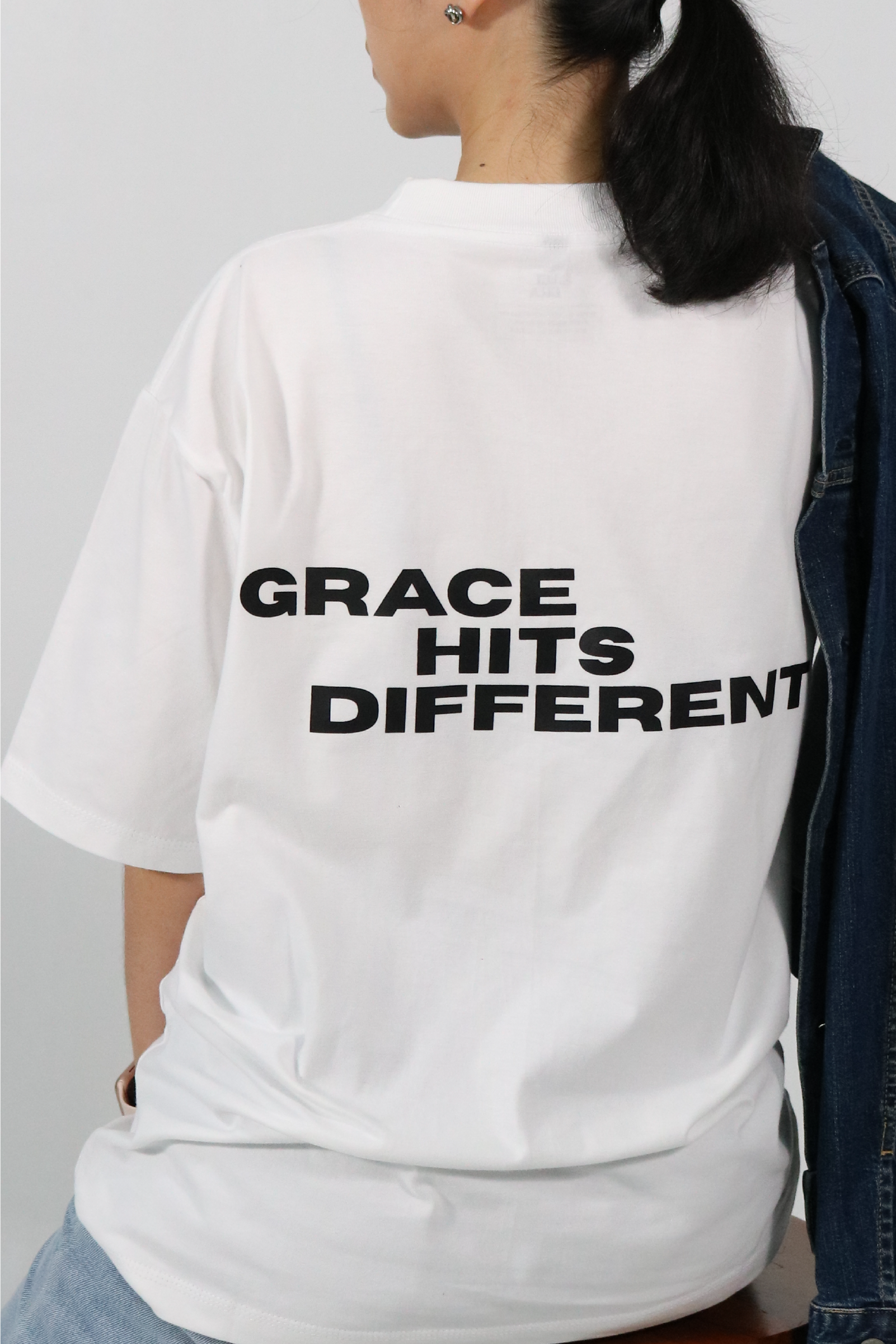 "Grace hits different" - Oversized White T-Shirt