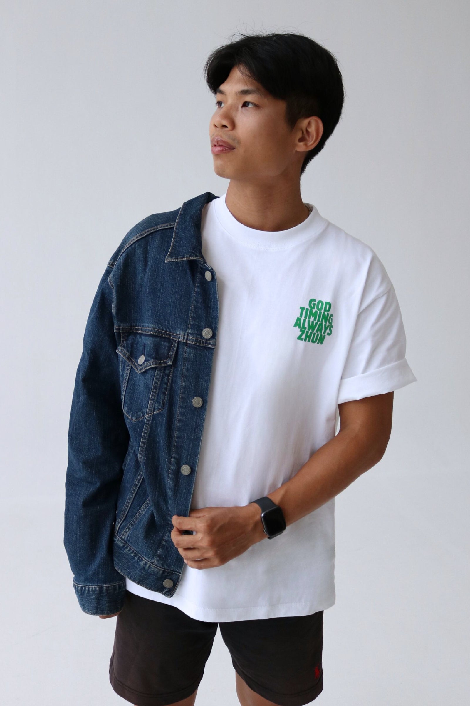 Oversized graphic white T-shirt front design - "God timing always zhun"