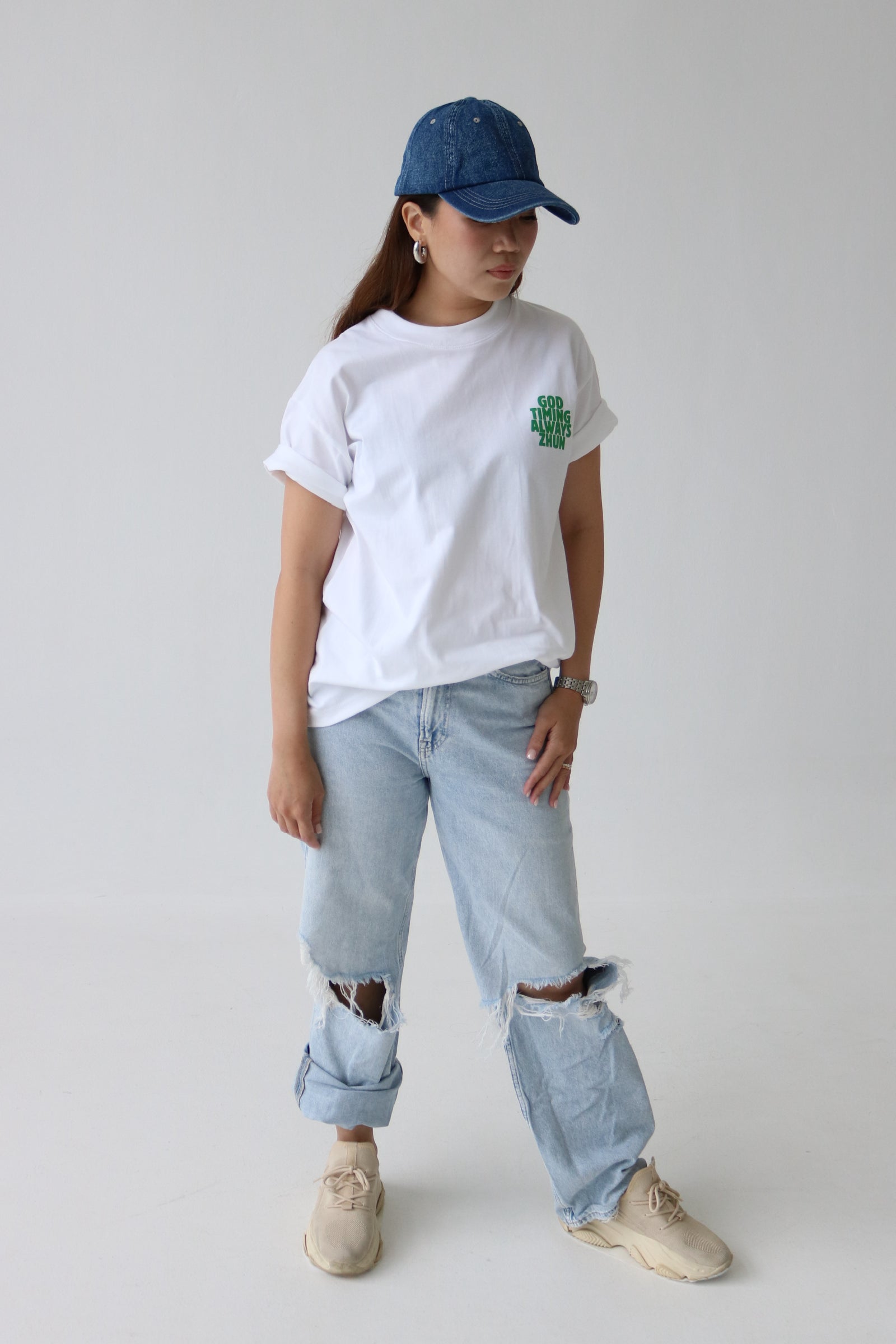 Oversized graphic white T-shirt front design - "God timing always zhun"